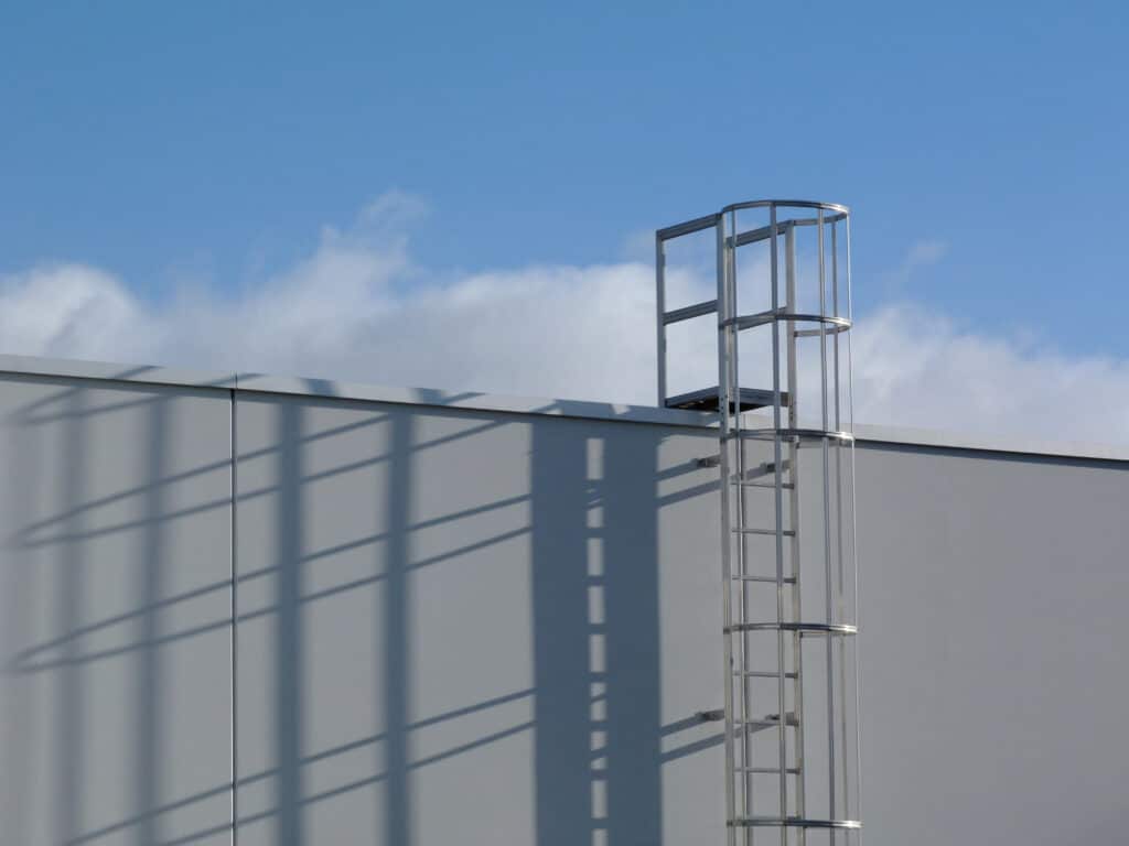 Cage Ladders from McAbe Inc. They are Custom Made to fit your warehouse needs.